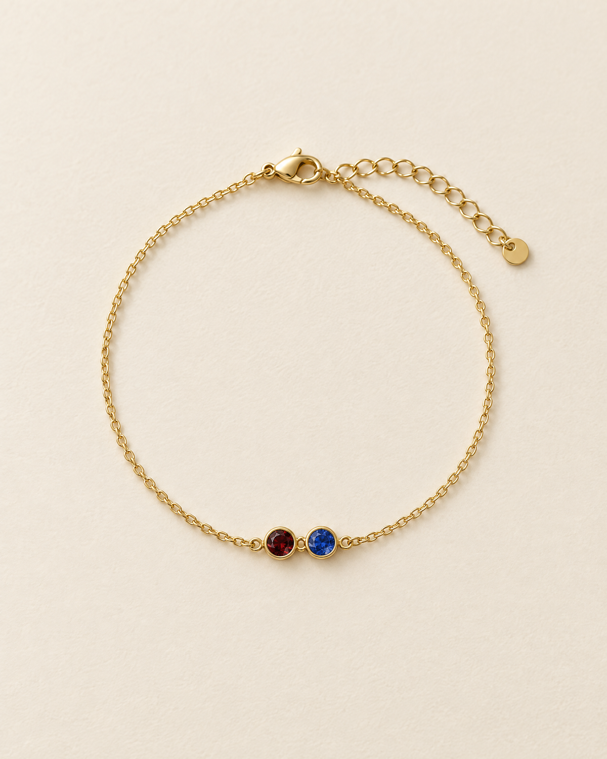 Bracelet Pierres de Naissance, finition dorée : deux pierres de couleur, rouge et bleue