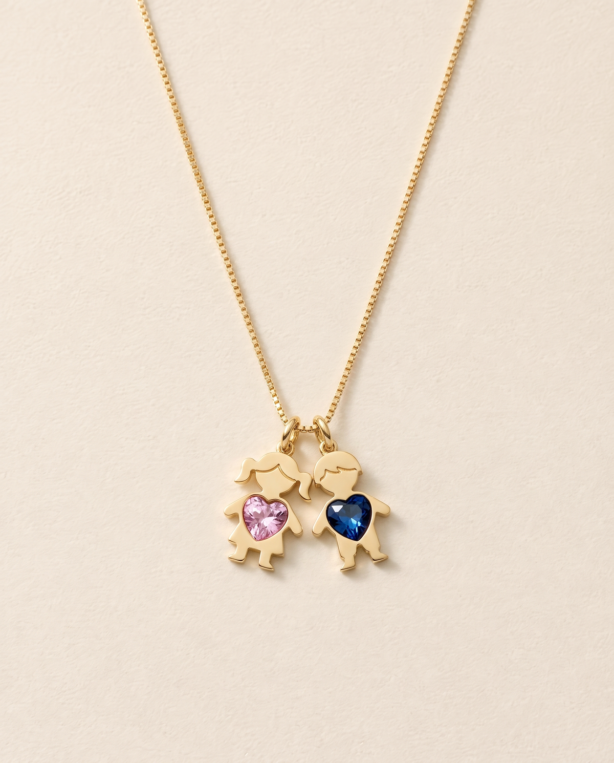 Collier Mes Enfants, pierres rose et bleu : une fille et un garçon sur chaîne dorée
