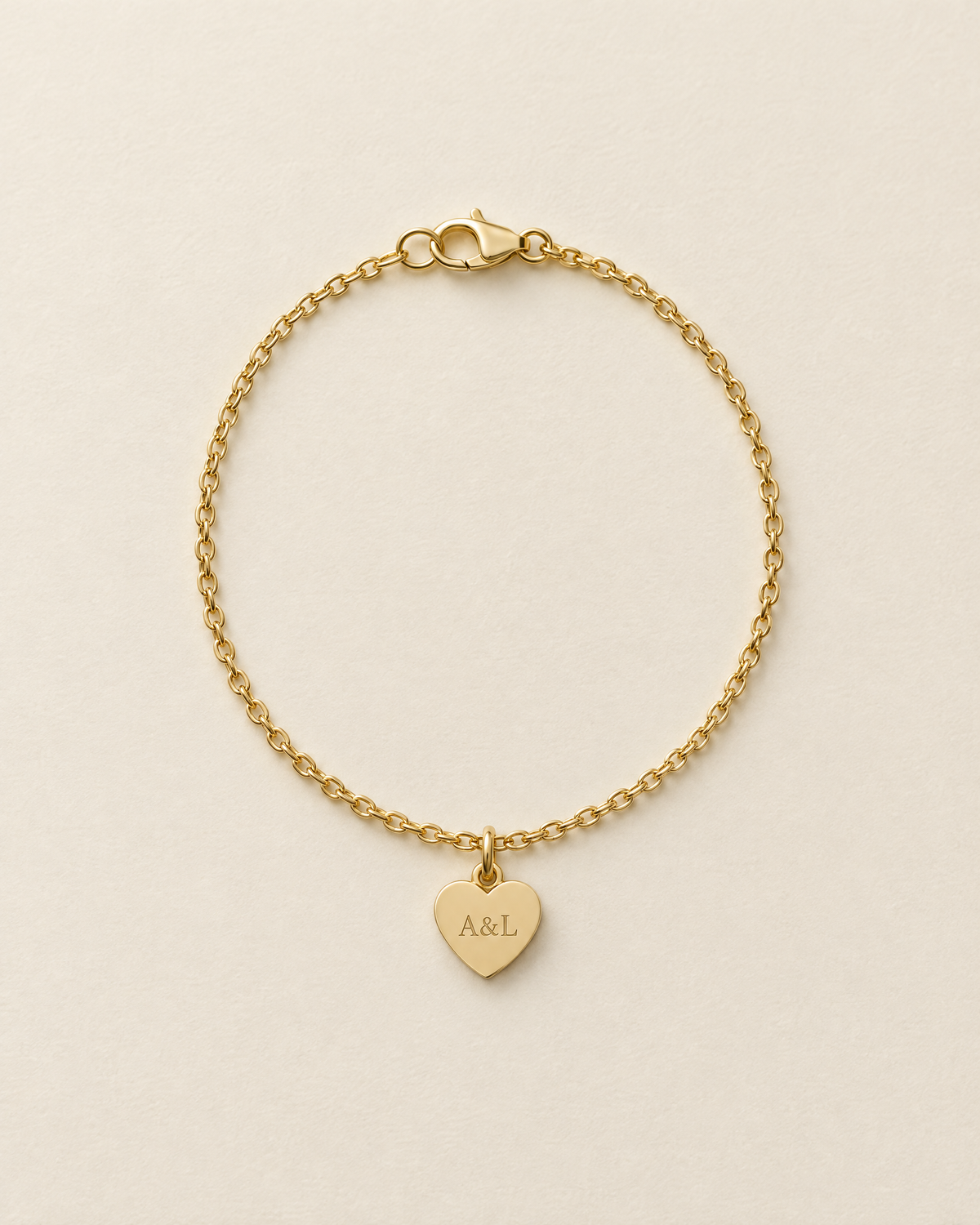 Bracelet Initiale, modèle Cœur gravé, finition dorée : initiales A&L