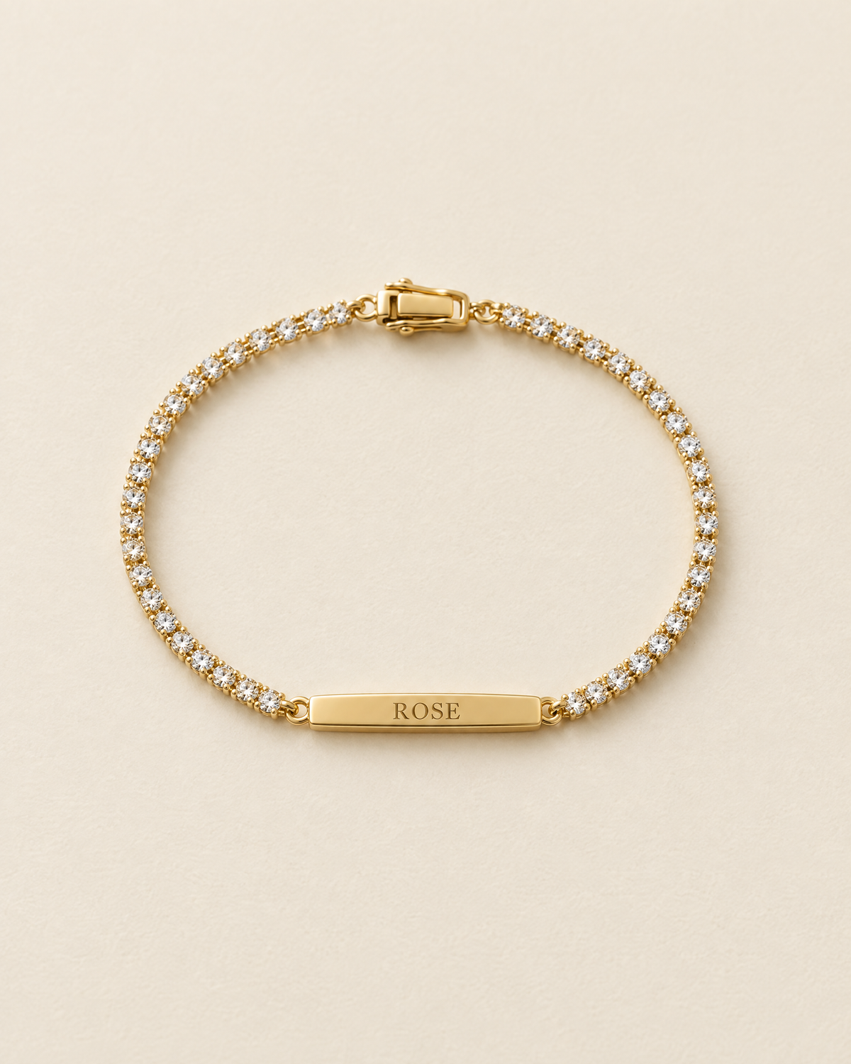 Bracelet Plaque Gravée, modèle Éclat, finition dorée : chaîne sertie de zircons et plaque ROSE